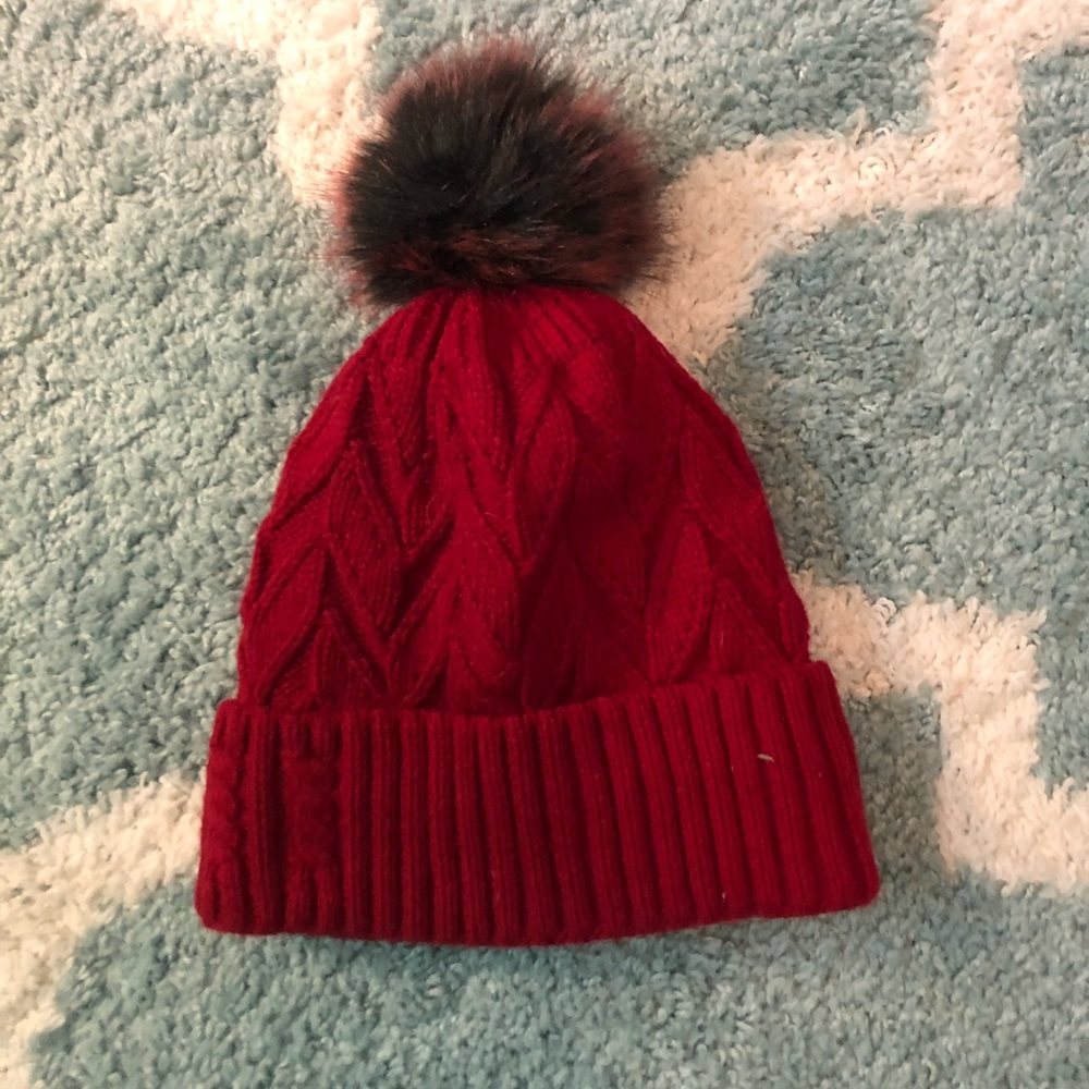 Red knit hat with faux fur lining